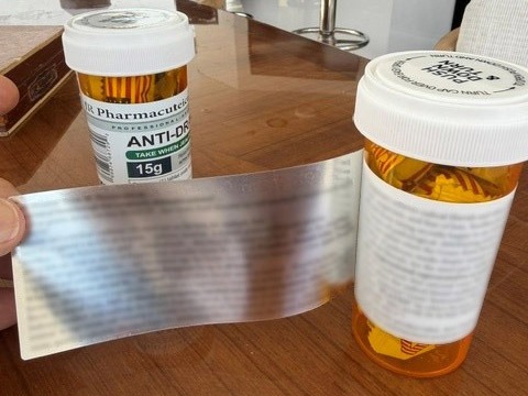 anti-dramin bottle contents peel back label blurred